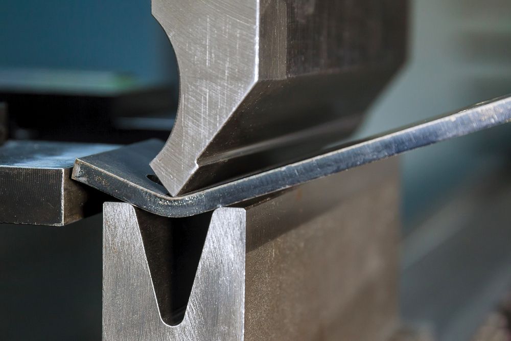 Bending metal sheet