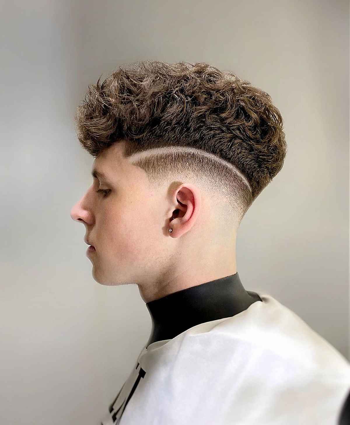 Low Taper Fade Curly Hair Styles for Men