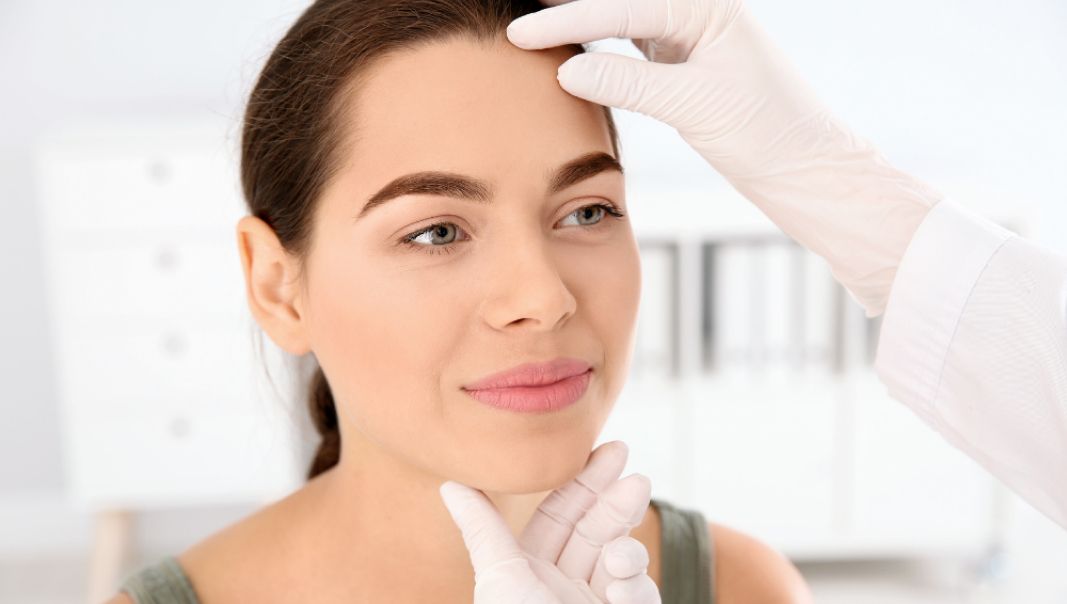 Can a dermatologist treat a skin infection?